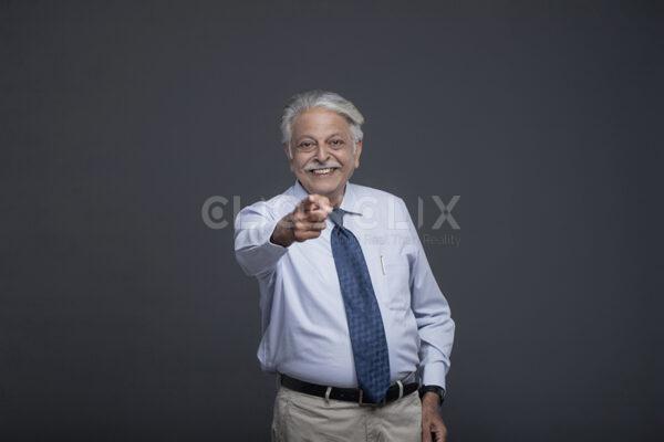 Senior Man Pointing, Cliqnclix